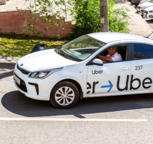 Car with uber branding on it's doors