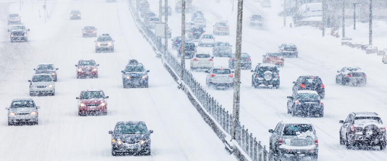 Cars driving on Cook County highway in the snow