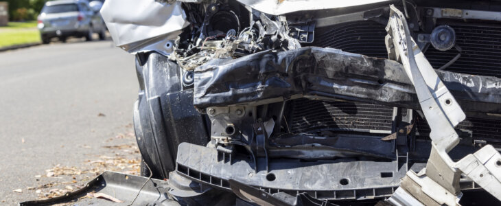 Closeup front view of damaged car